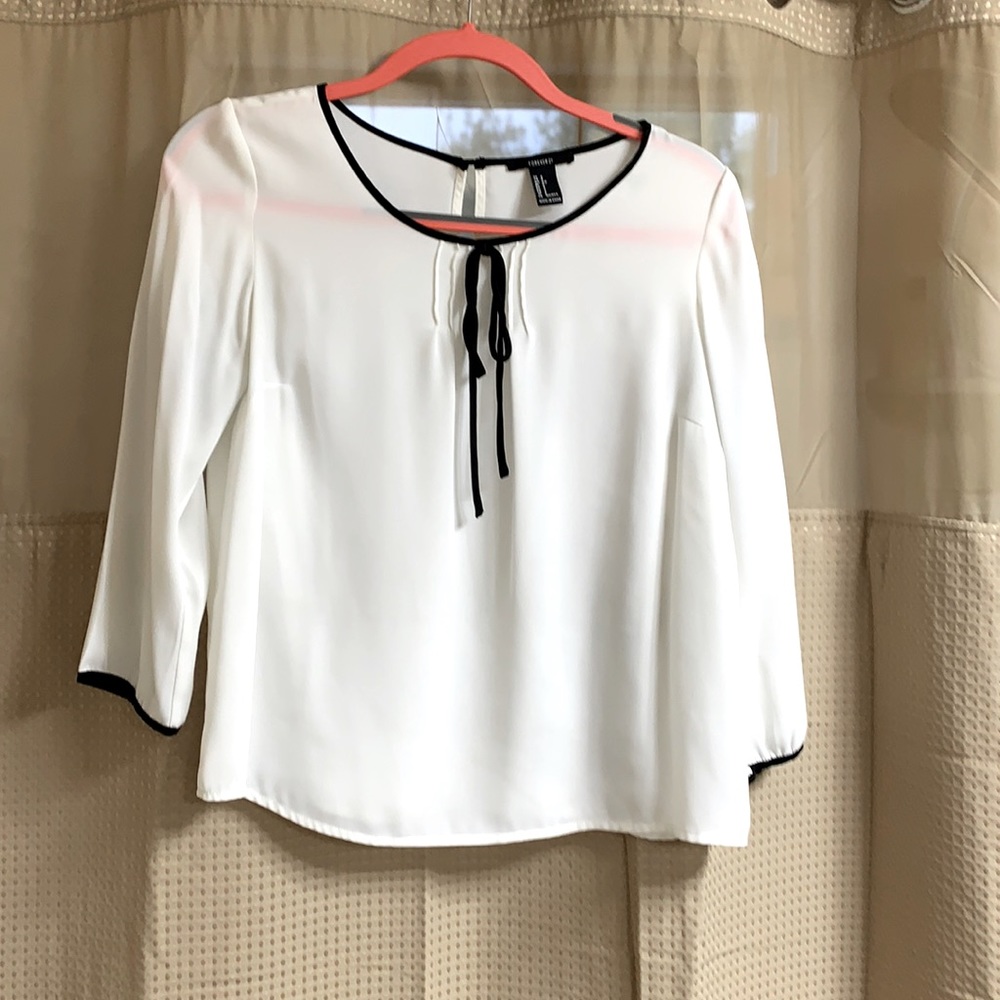 White blouse with black detailing